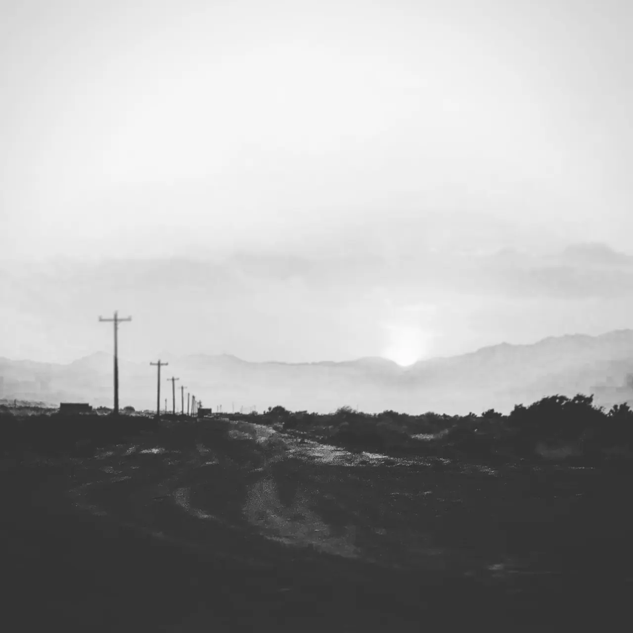 A quiet stretch of old Route 66 at sunset.