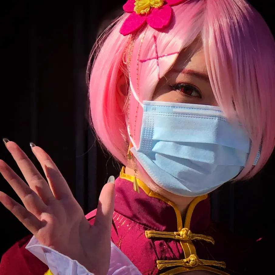 A pink-haired costumed visitor in Little Tokyo.