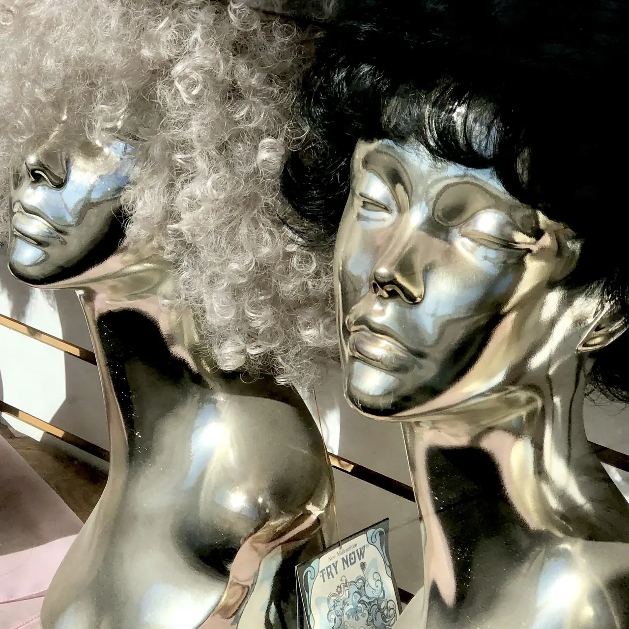 Metallic mannequins in the Garment District.