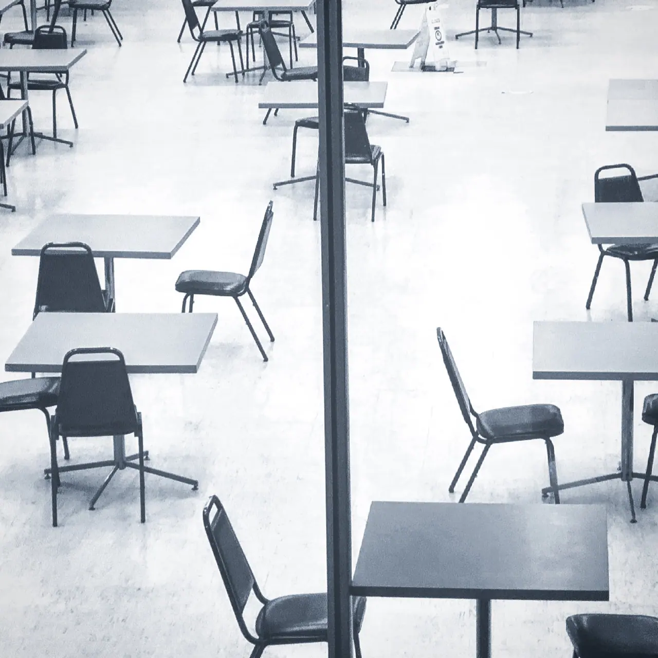 Empty tables and chairs at the Hall of Records.