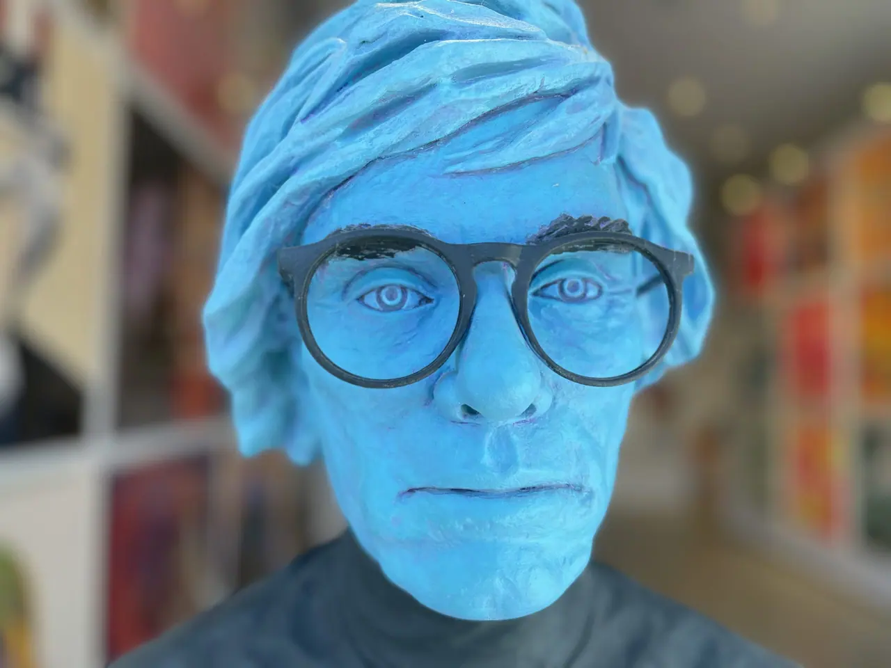 A blue portrait bust in Santa Monica.