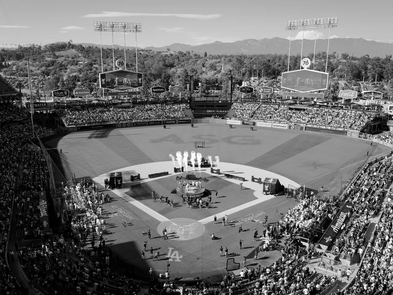 A wide view of a pregame ceremony on the diamond at Dodger Stadium.