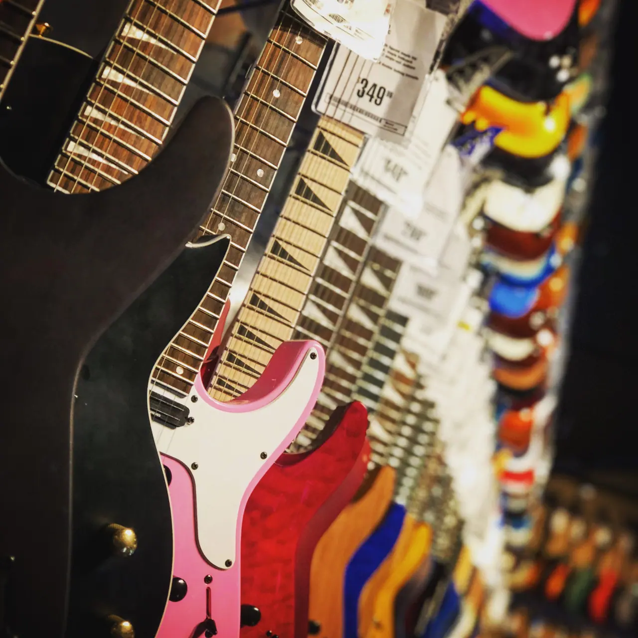 A row of electric guitars at Guitar Center in Hollywood.